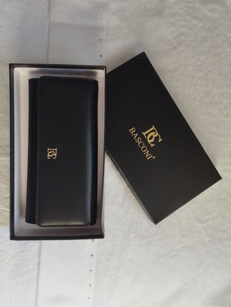Продам новый  кожаный кошелек от фирмы BASCONI