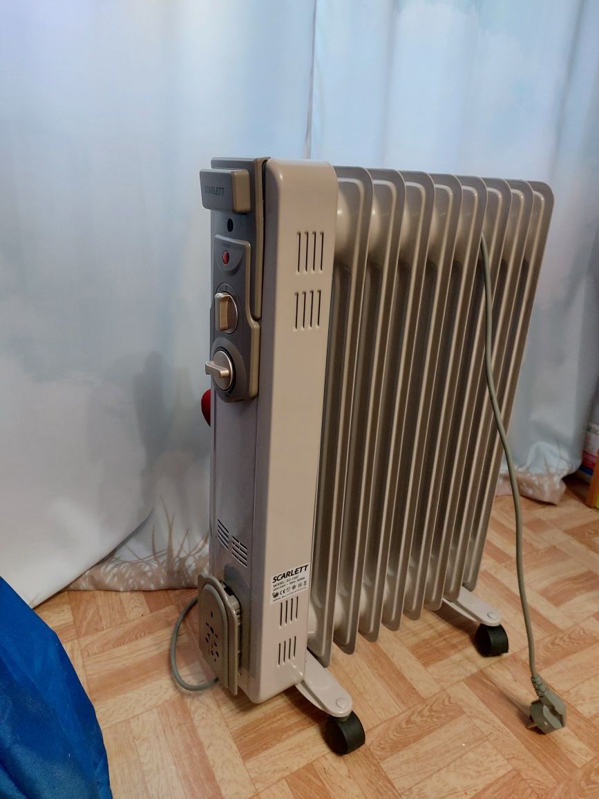 Продам масляный радиатор