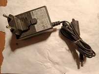 Продам адаптер питания   12V--2A.