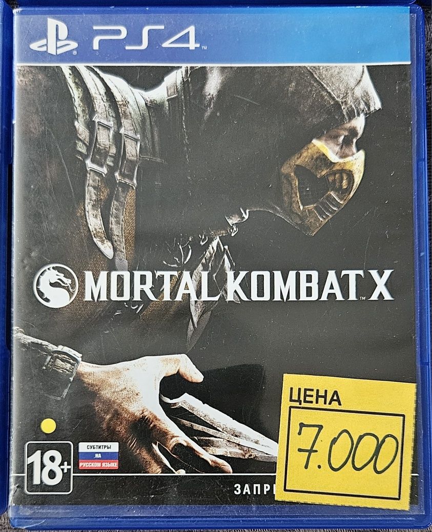 Продам игровую приставку  Ps4 и 10 игр.