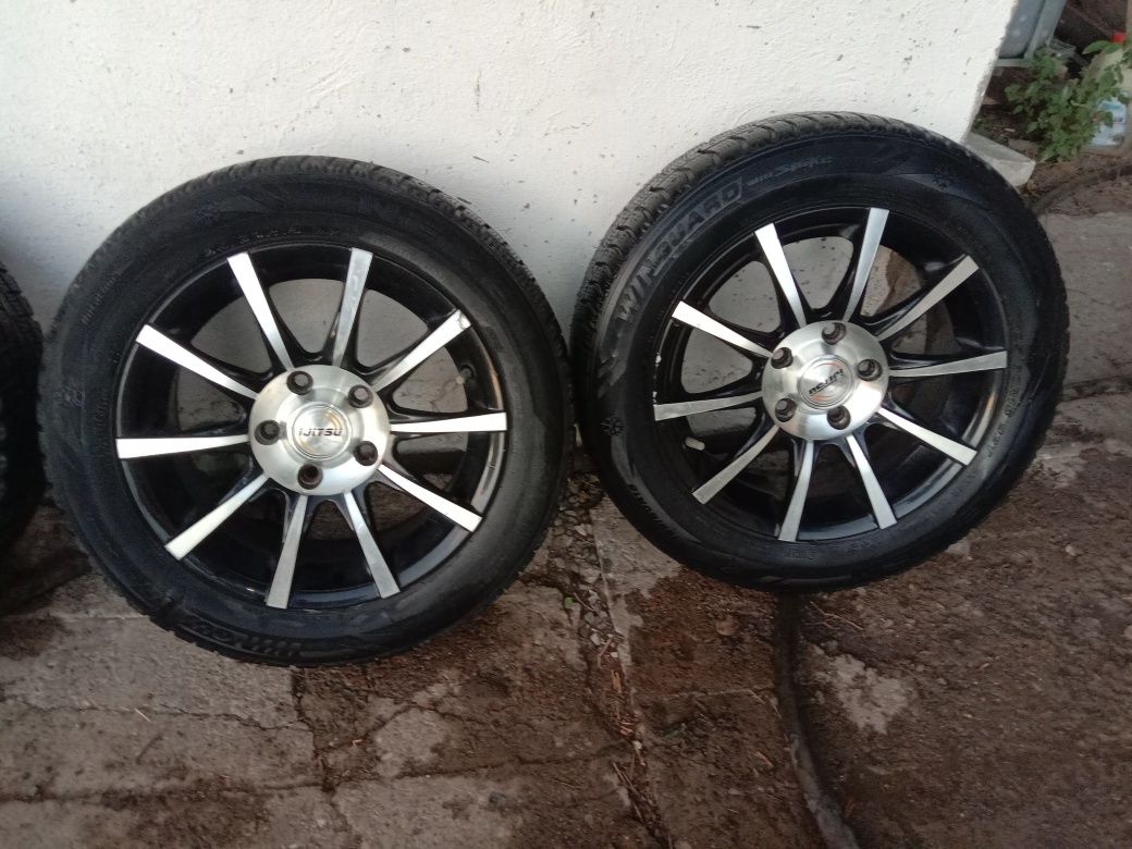 Продам титановые диски р 15 с резиной