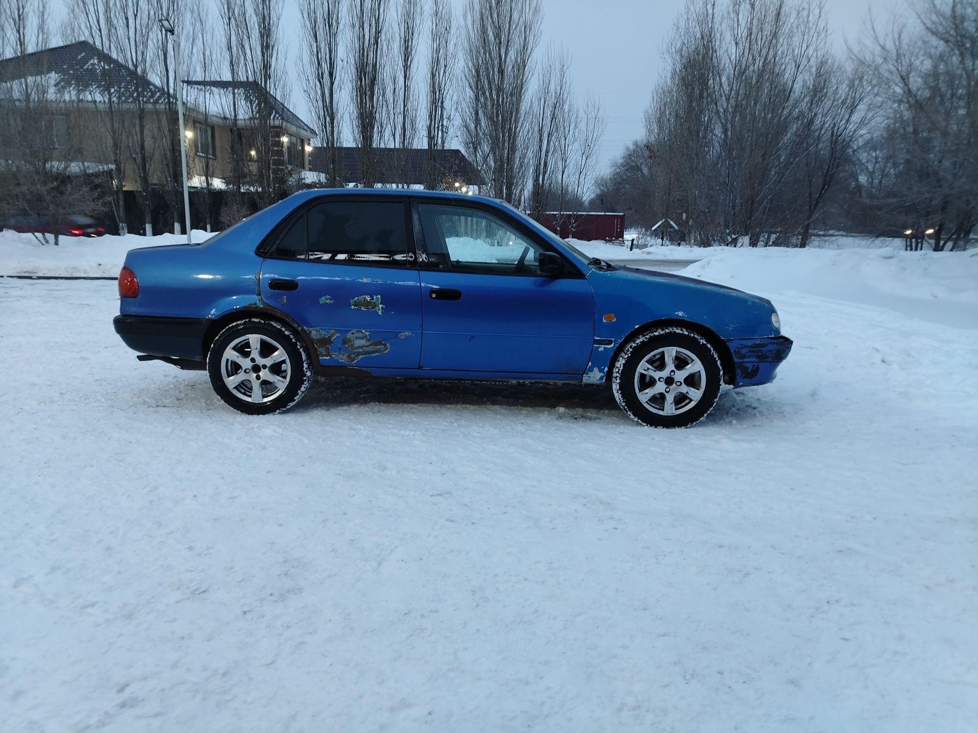 Тайота королла е 110