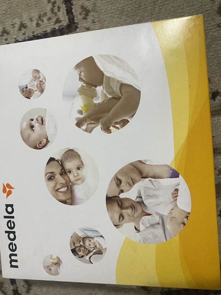 Продам электрический молокоотсос medela mini electric