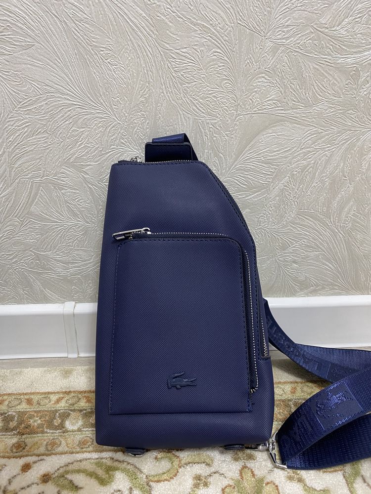 Барсетка Lacoste состаяния новая дизайн красивый