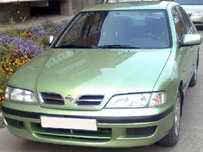 стекло фары Nissan Primera P11