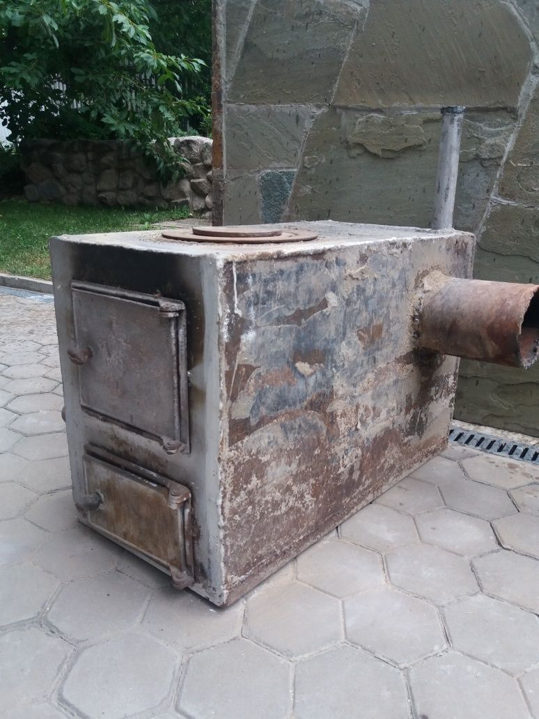 Продам печку на угле с водяным контуром.