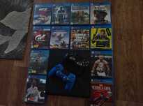 Продам Ps4 с игровыми дисками