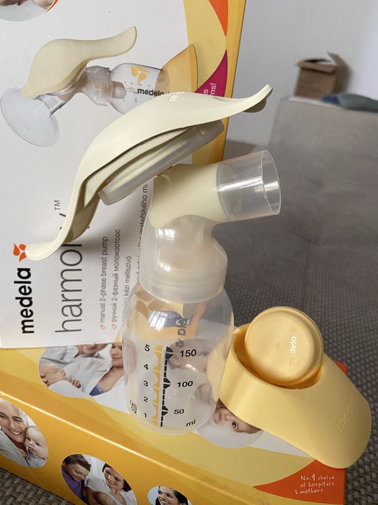Medela  Ручной 2фазный молокоотсос harmoy