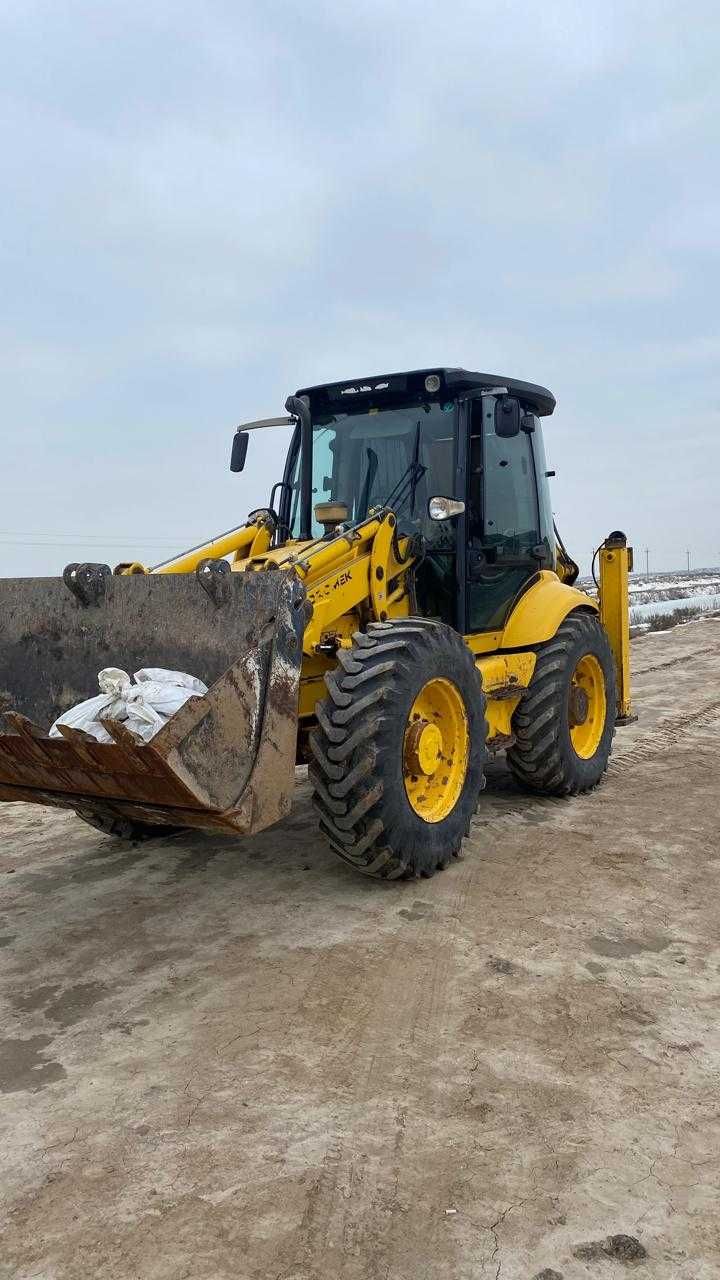 Эксковатор погрузчик 3в1 Атырау аренда.