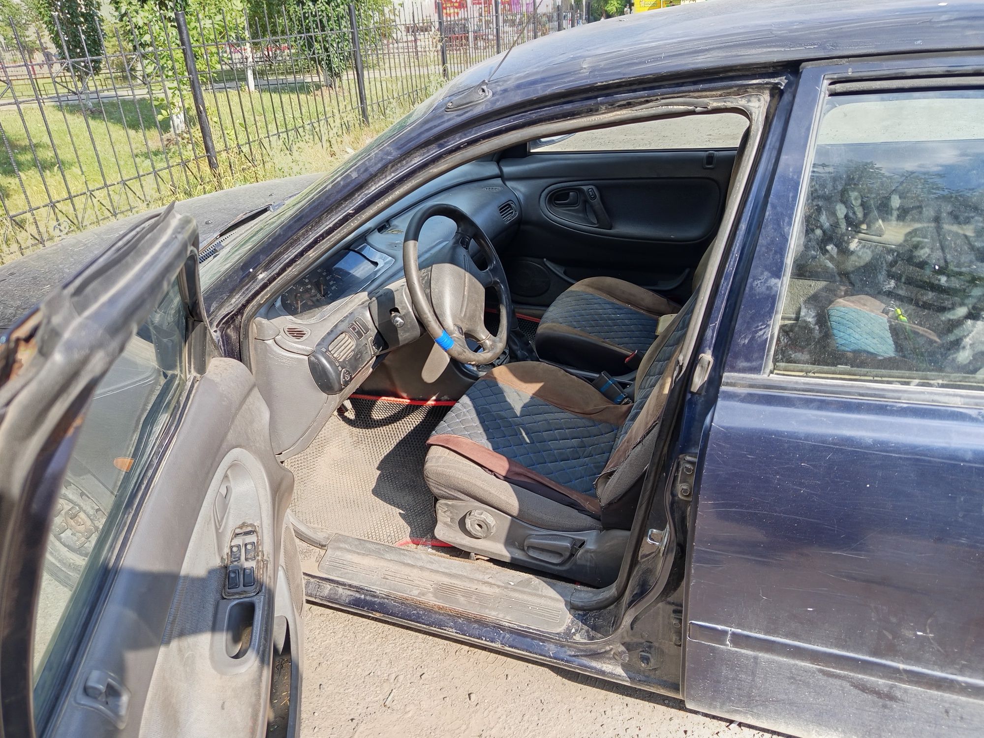 Автомобиль Мазда 626 кронос