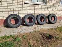 Продам летнюю резину А/Т  235/85 R16. Диски в подарок.