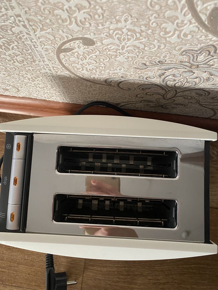 Продам . Тостер Braun