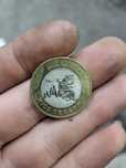 Монета 100 тнг продам монету