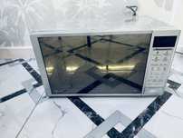 новая микроволновка LG MH6043DAR
