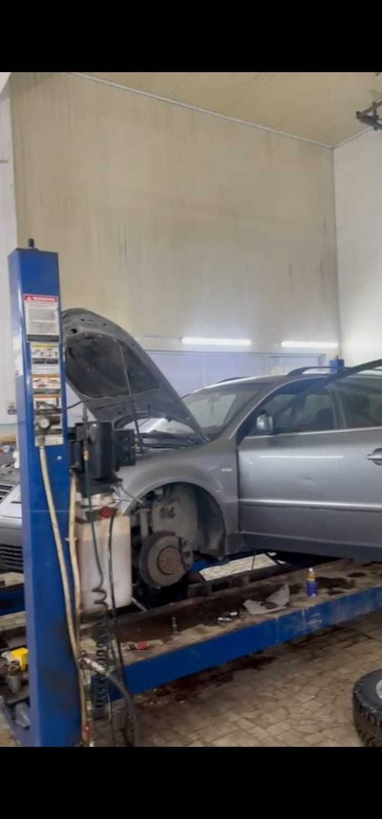 Подъемник автомобильный для СТО 4-х стоечный.