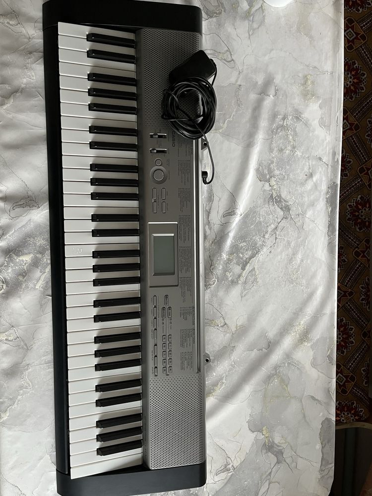 Синтезатор CASIO. 100 мелодий 100 тона.
