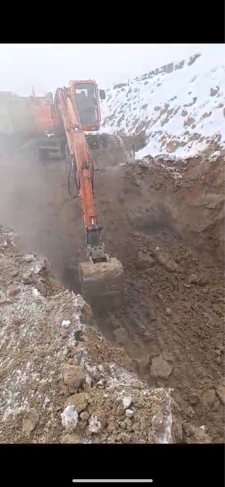 Колесный экскаатор 1 куб услуги