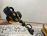 Аккумуляторный триммер DeWALT DCM571N-XJ