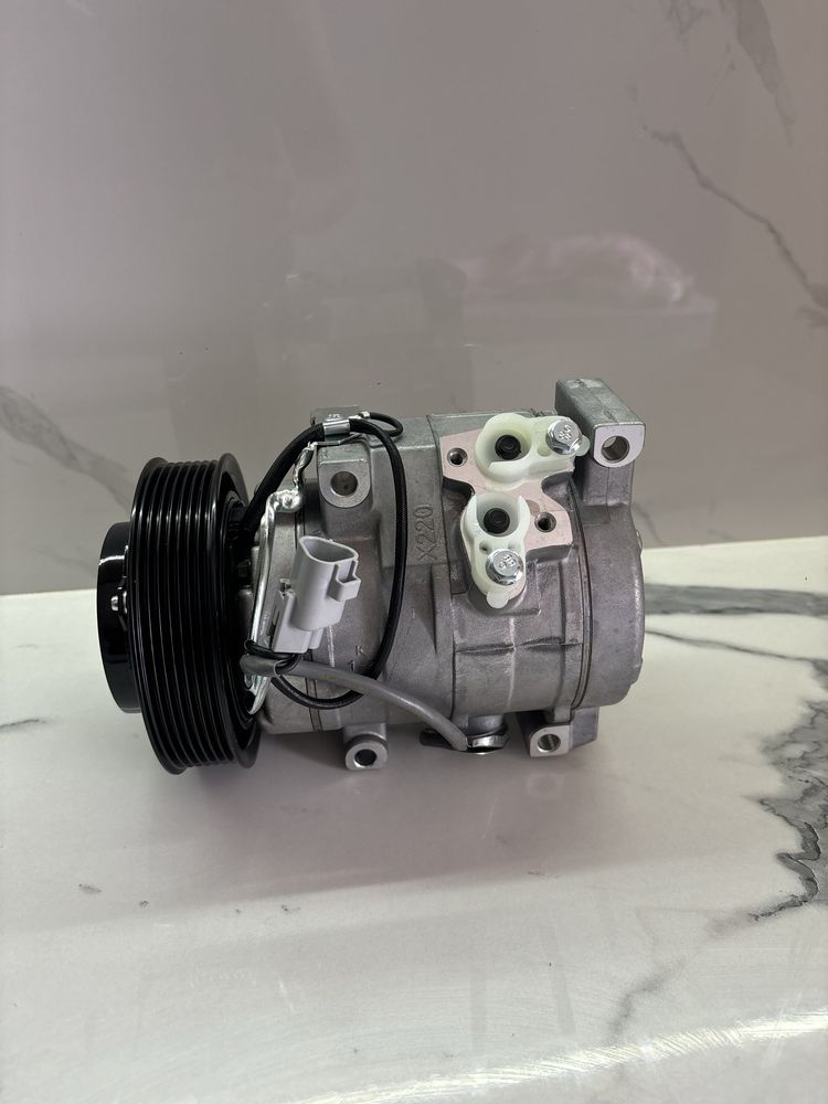 Компрессор кондиционера на Toyota Camry 30, RAV 4, Highlander, Previa