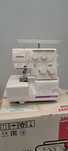Оверлок бытовой Janome 8002DX