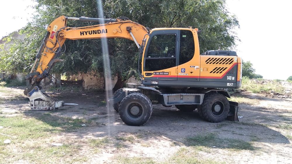 Услуги экскаватор Хундай 140 колесный