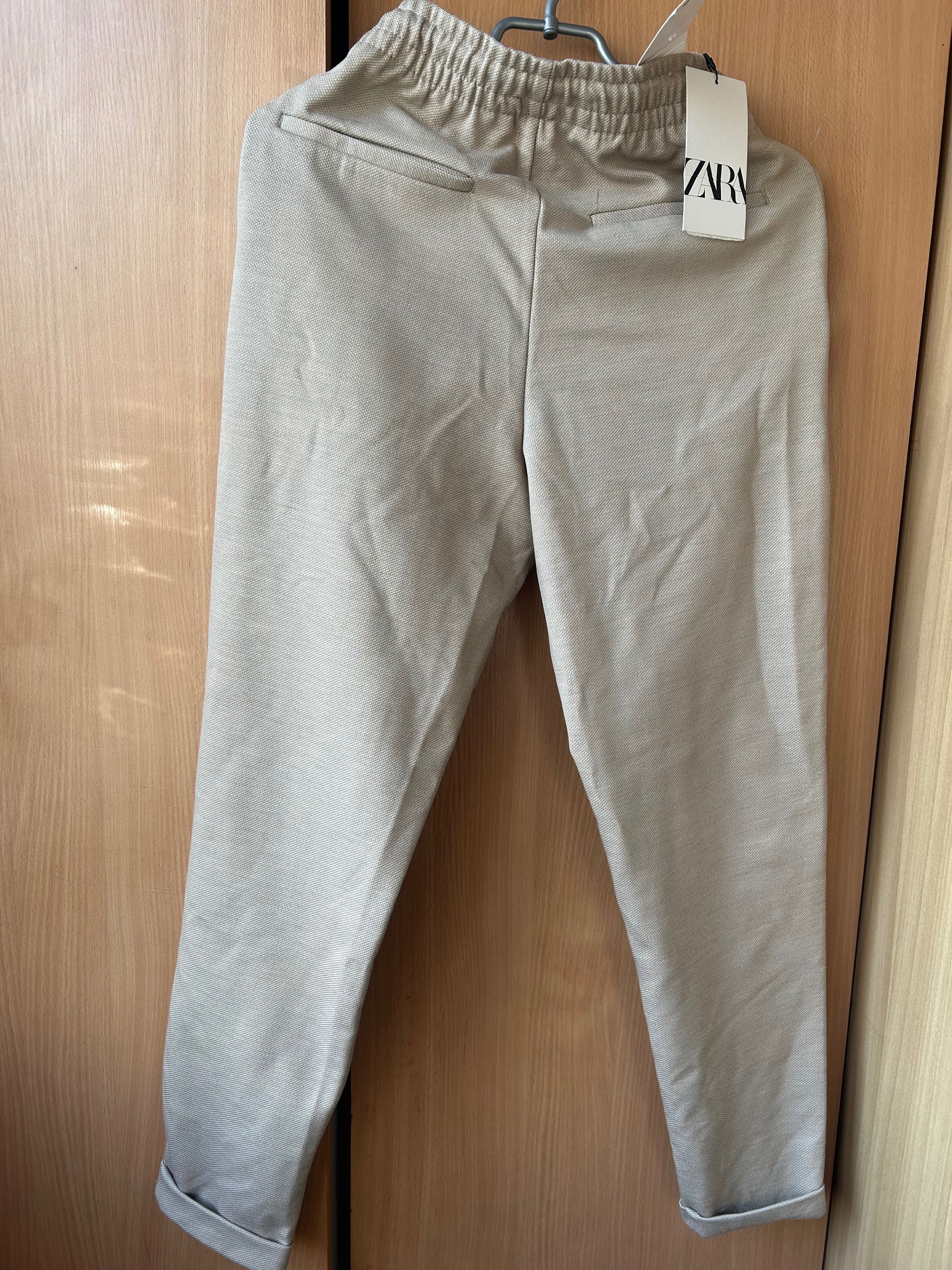 Новые брюки zara бежевые
