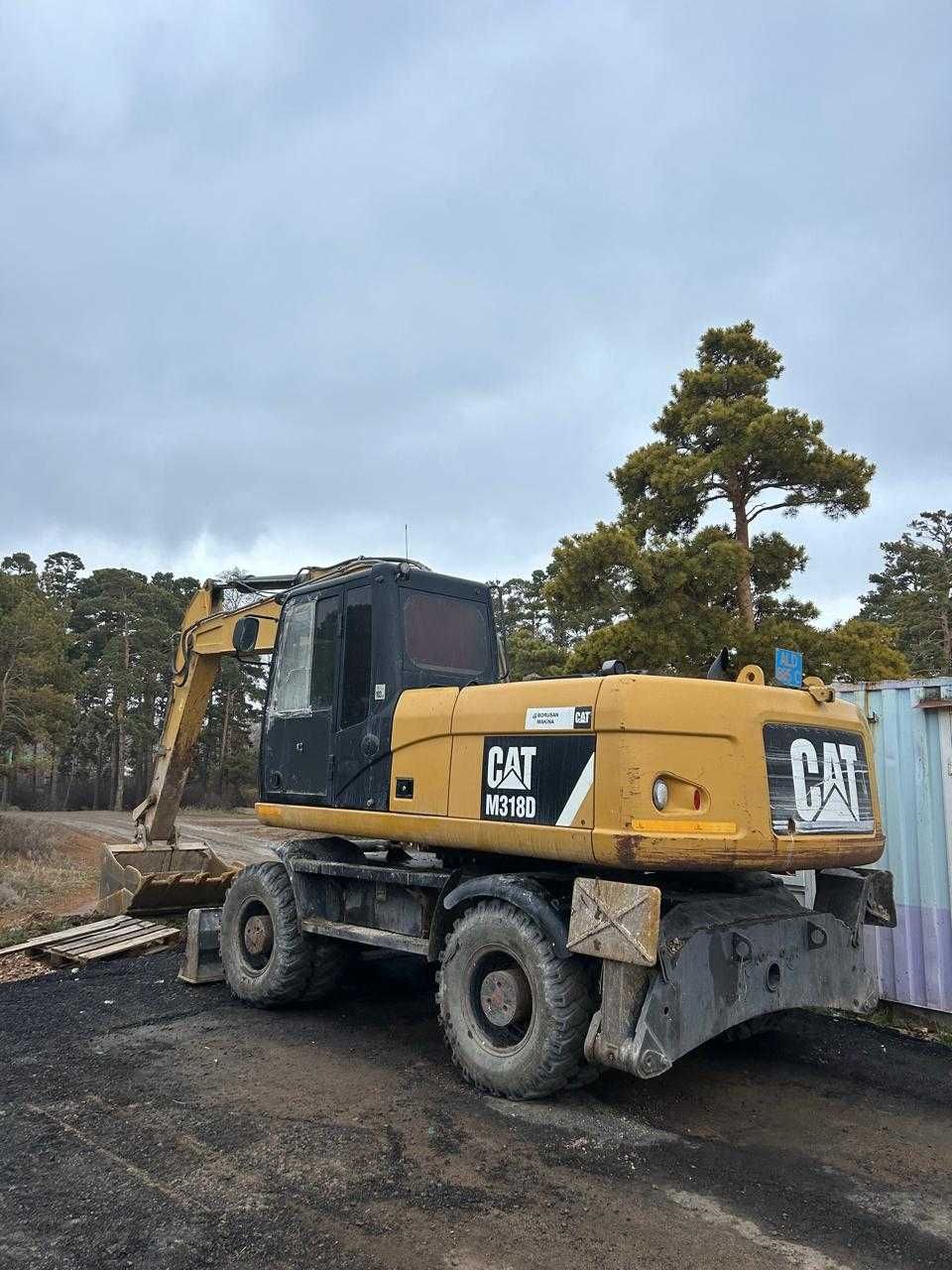 Услуги колесного экскаватора Сат М318D. Объём ковша 1.2 м3,