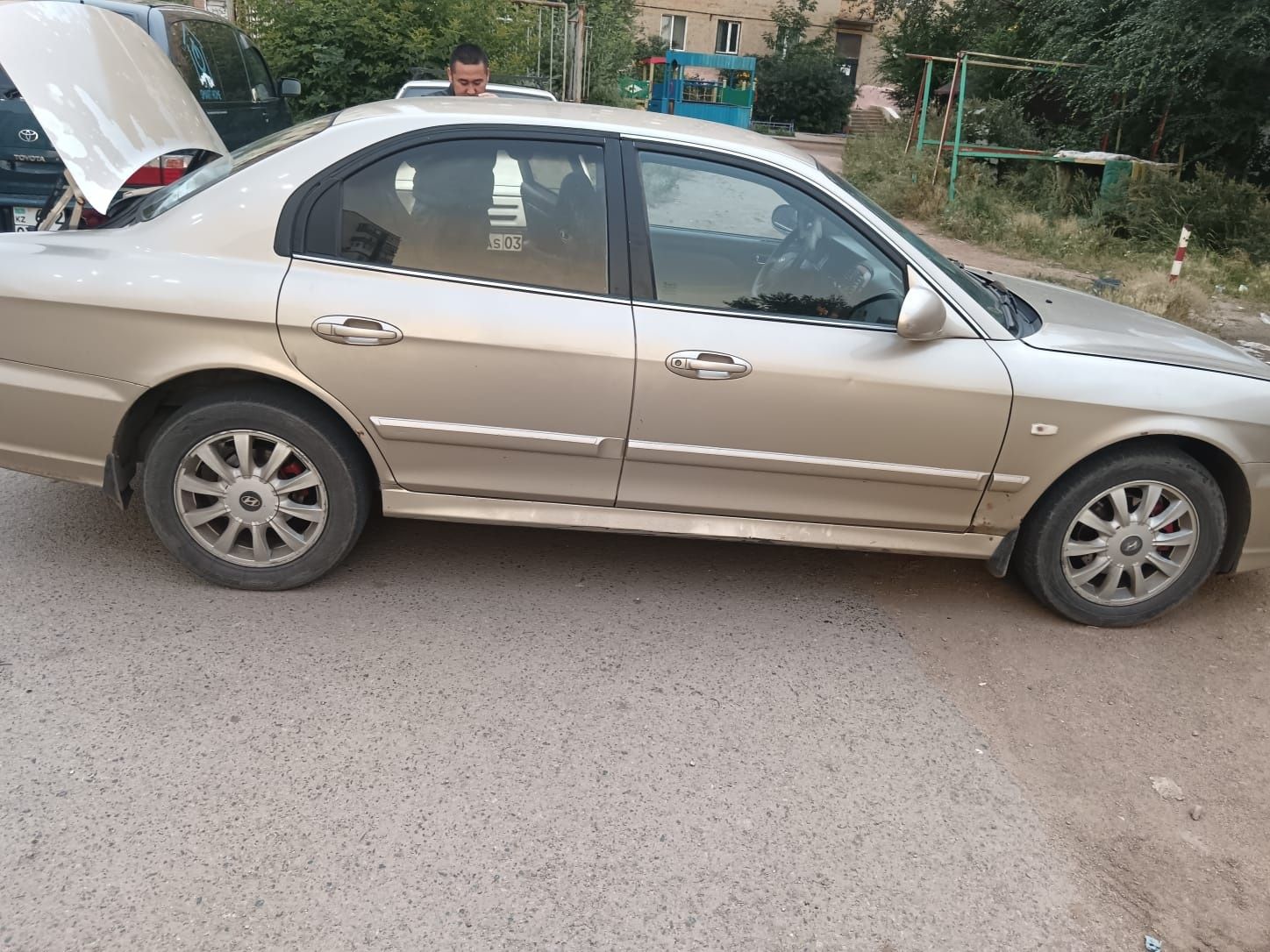 Соната 2004 года газ-бензин
