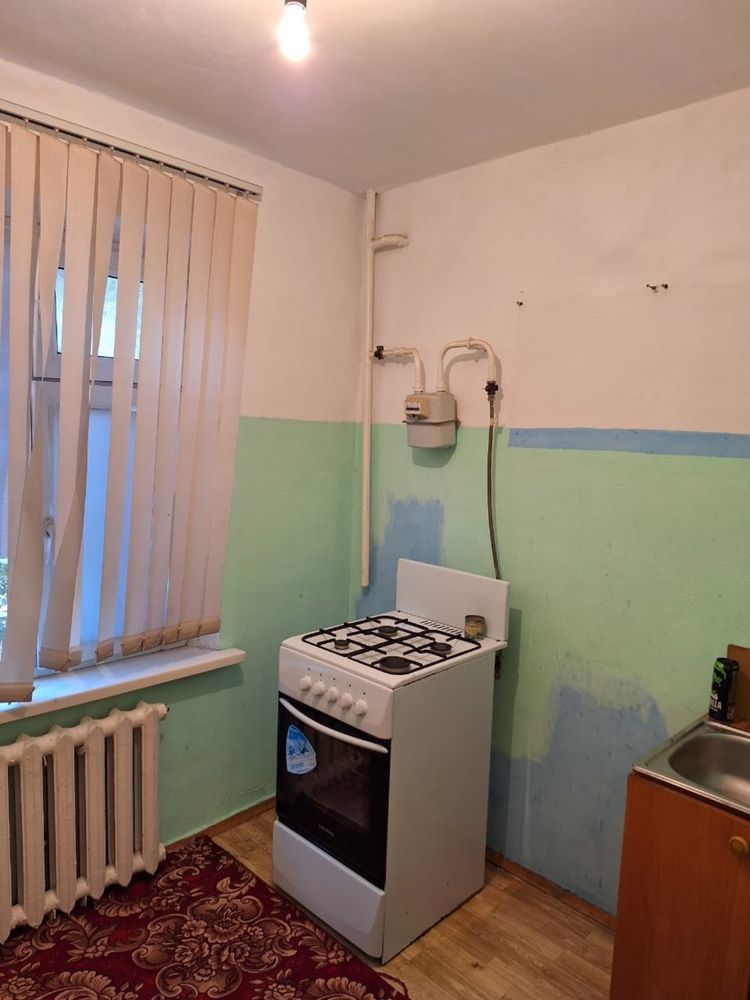 Срочно продам 1 мкр.32 дом 52кв. на 1 этаже 2 комнатный квартира