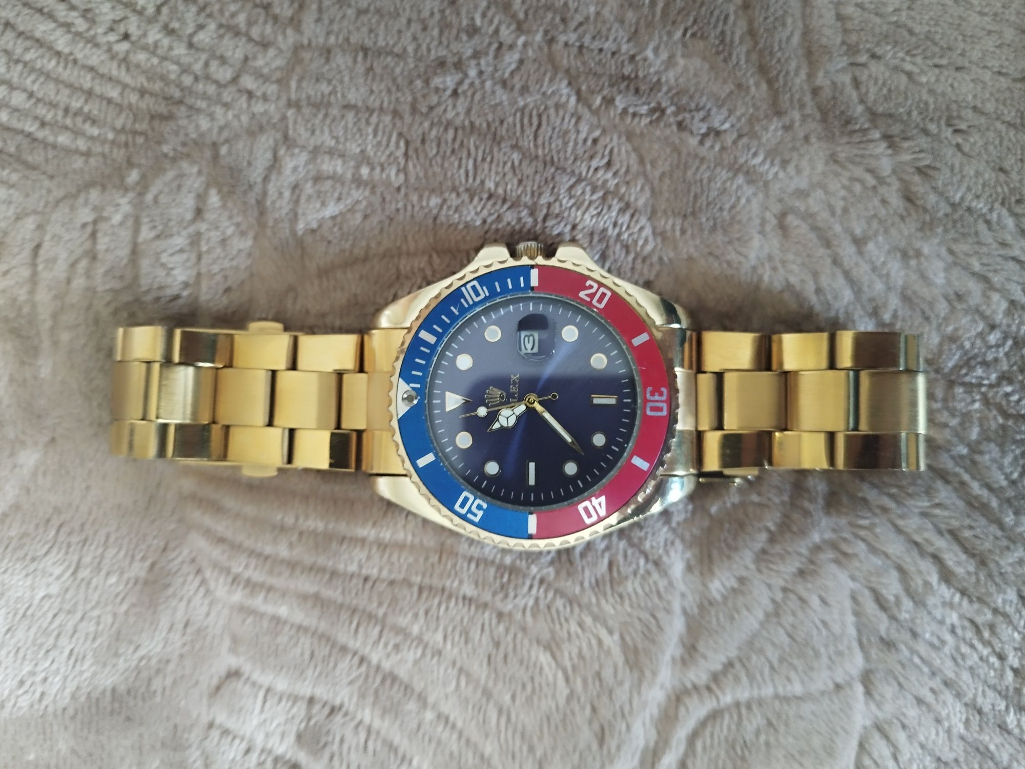 Часы Rolex золотистый