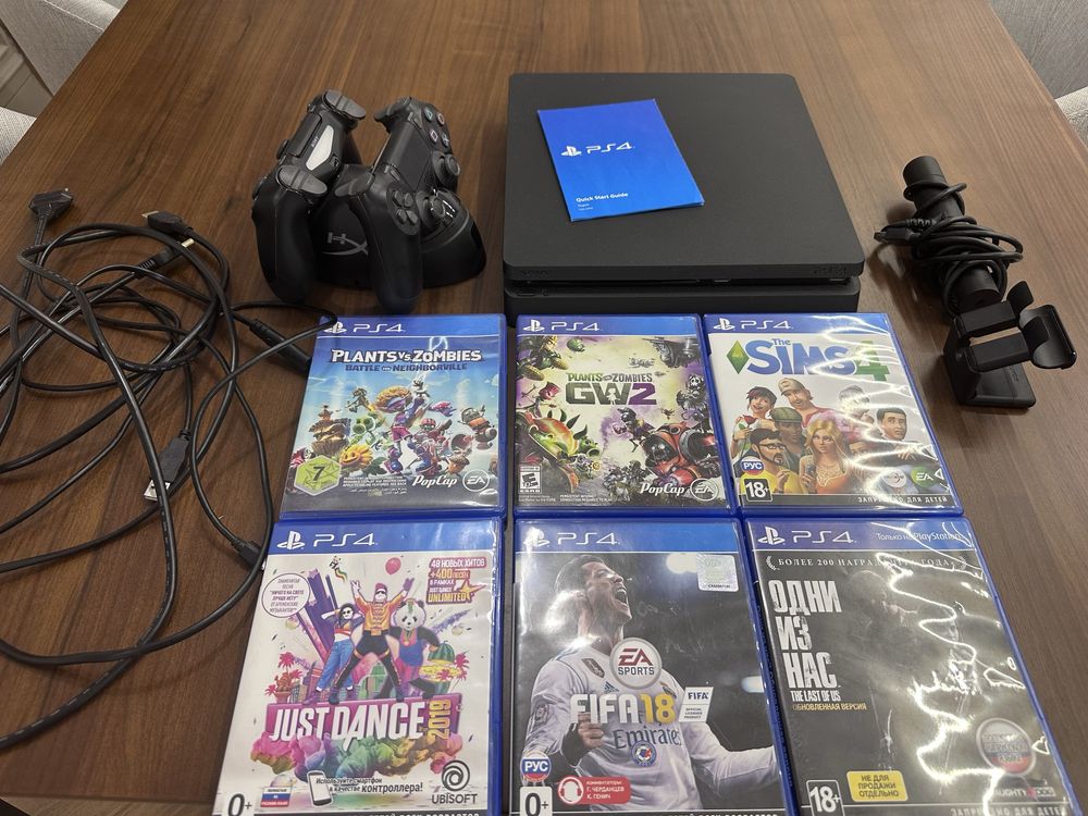 Продам PS4 slim, с двумя джойстиками и камерой, играми.