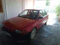 Автомобиль Мазда 323