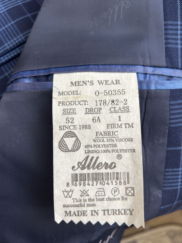 Продам новый костюм