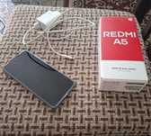 Срочно продается Xiaomi Redmi A5 4 ГБ/128 ГБ черный + подарок наушник