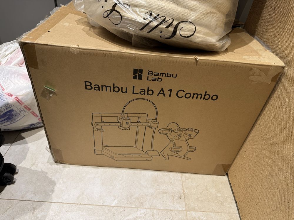 Продам 3D-принтер Bambu Lab A1 Combo + AMS (мультифиламент)