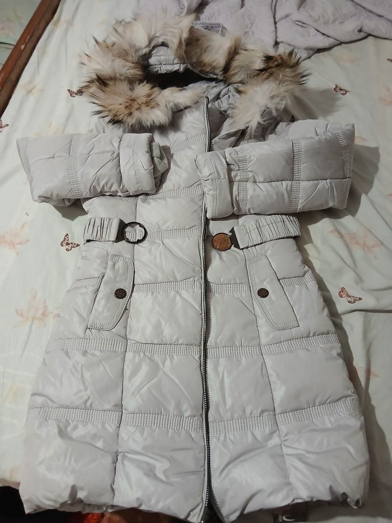 Продам пуховик новый на возраст от 8 до 12 лет
