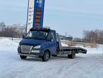Услуги эвакуатора по городу и области