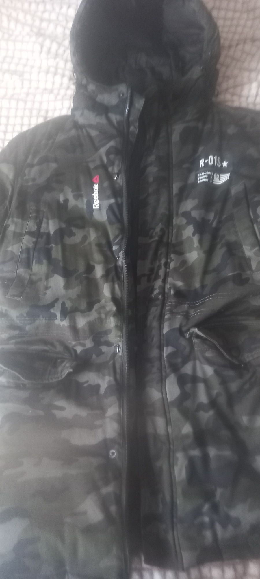 Продам пуховик марки Reebok