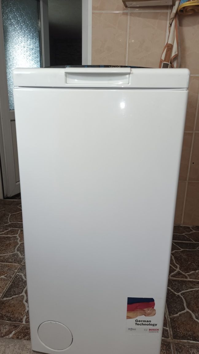 Стиральная машина Bosch classixx6 с вертикальной загрузкой