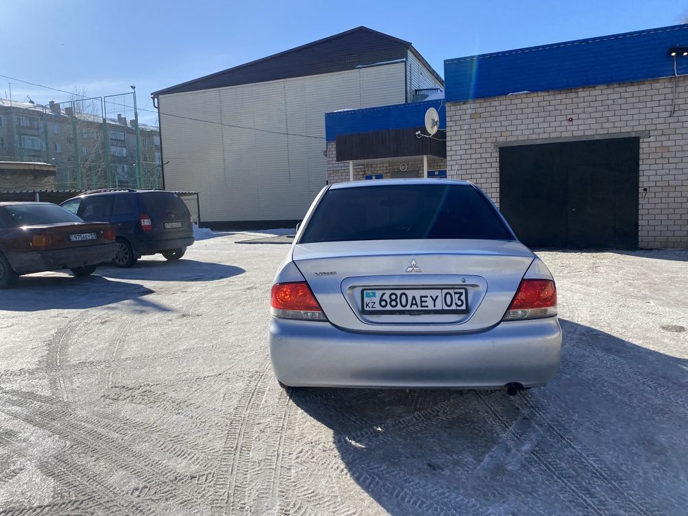 Машину продам лансер в хорошом состояние оброщайтесь по номеру