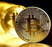 Монета Bitcoin..