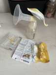 Ручной молокоотсос medela