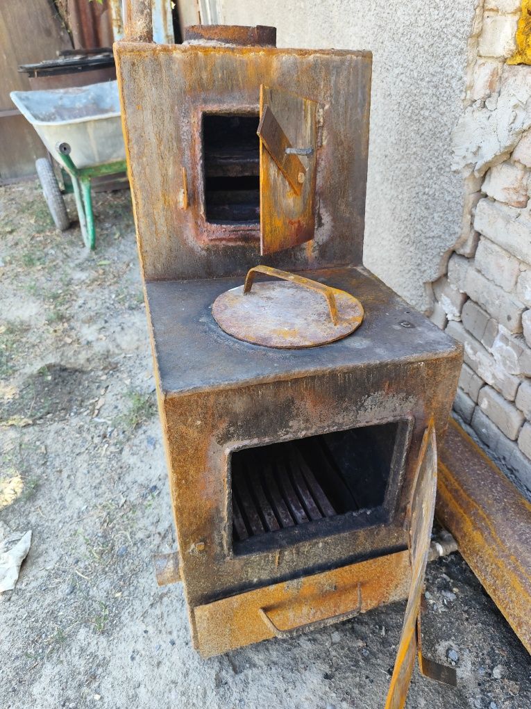 Продам Угольный чугунную печку(Сапог)