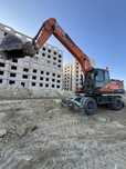 Предоставляем услуги колесный экскаватора