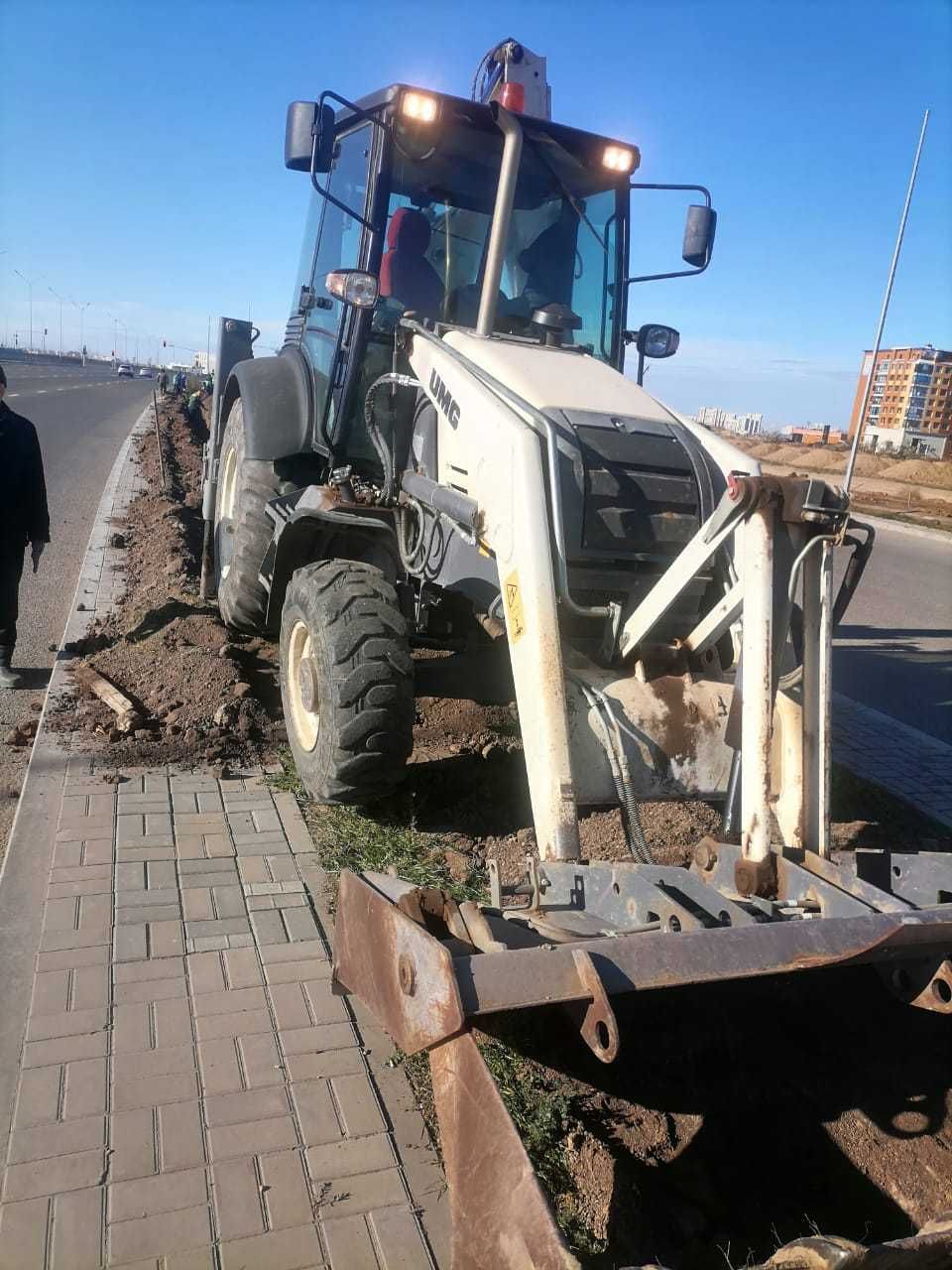 Продам или обменяю Экскаватор-погрузчик UMG TLB825