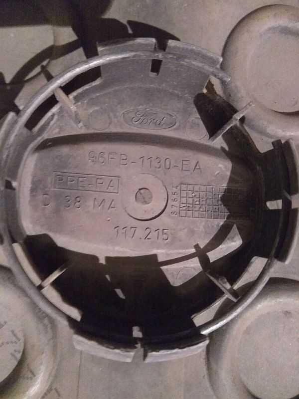 Продам колпачки к оригинальным титановым дискам на Ford.