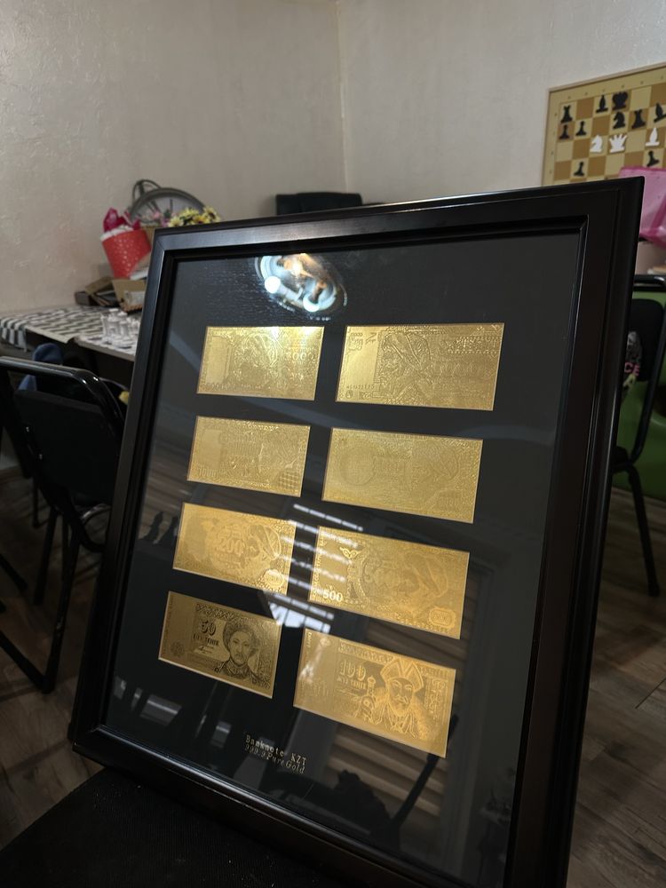 продам настенную картину с золотыми банкнотами 999проба