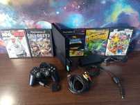 PlayStation 2 с игровыми дисками и memory card fmcb