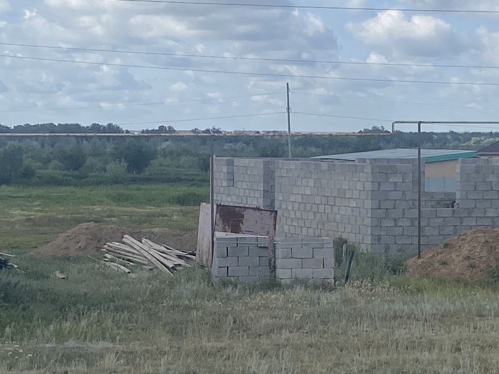 Продам участок с недостроенным домом