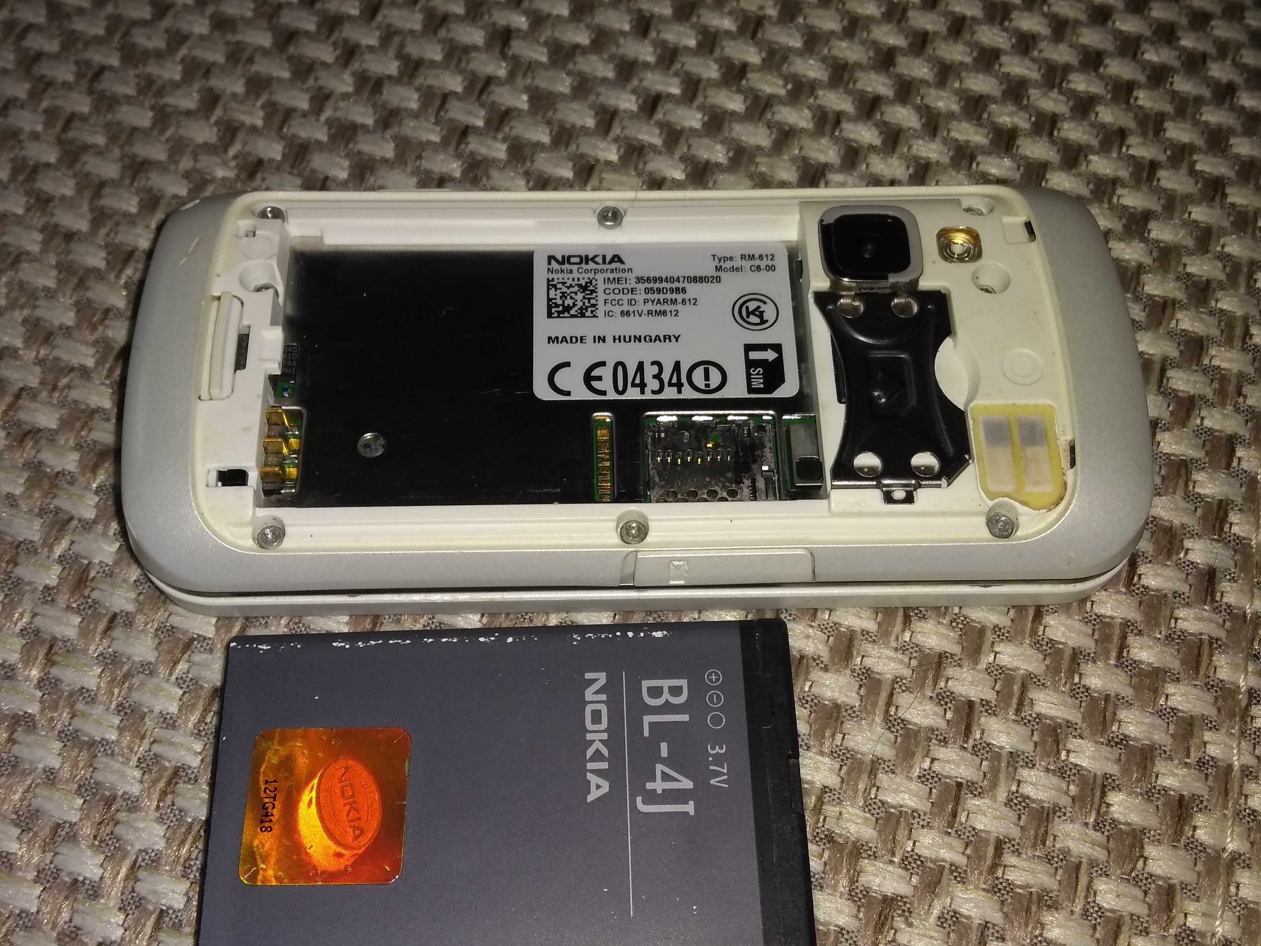 Продам наушники Nokia, смартфон Nokia C6-00 на запчасти, зарядку Nokia